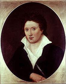 Half-length oval portrait of a man wearing a black jacket and a white shirt, which is askew and open to his chest.