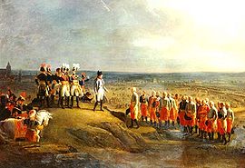 Colored painting depicting Napoleon receiving the surrender of the Austrian generals, with the opposing armies and the city of Ulm in the background